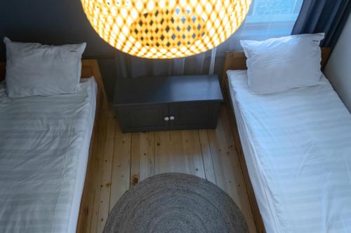 Ένα ή περισσότερα κρεβάτια σε δωμάτιο στο Eight Rooms Bansko