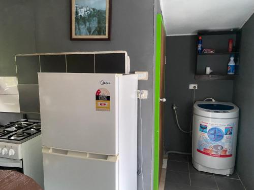 Kuchyň nebo kuchyňský kout v ubytování Island Home