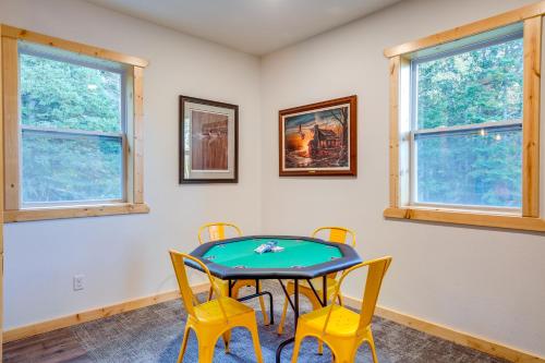 a dining room with a table and chairs at 15 Mi to Lake Superior Renovated Church with Grill in Toivola