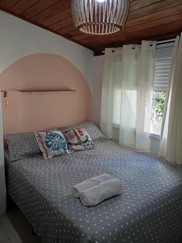 Postel nebo postele na pokoji v ubytování Casa da Aroeira