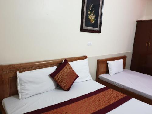 Postel nebo postele na pokoji v ubytování Phương Phương 2 Hotel