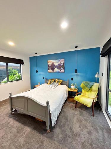 Ένα ή περισσότερα κρεβάτια σε δωμάτιο στο Peaceful beachside oasis