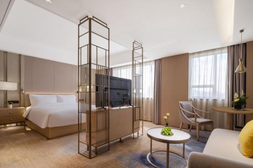 Area soggiorno di Grand Skylight Hotel Shenzhen Zhonghang