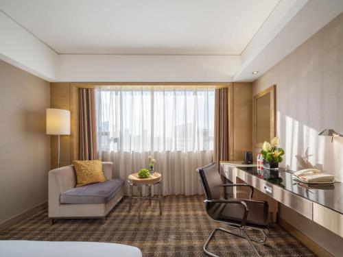 Area soggiorno di Grand Skylight Hotel Shenzhen Zhonghang