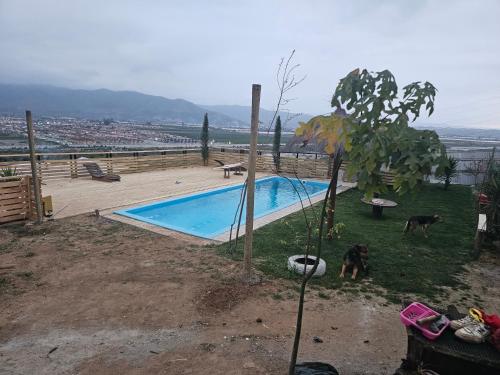 Πισίνα στο ή κοντά στο Cabaña 01, con piscina