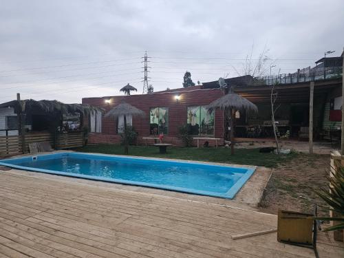 Πισίνα στο ή κοντά στο Cabaña 01, con piscina