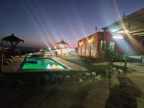 Πισίνα στο ή κοντά στο Cabaña 01, con piscina