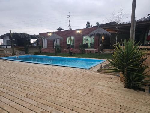 Πισίνα στο ή κοντά στο Cabaña 01, con piscina