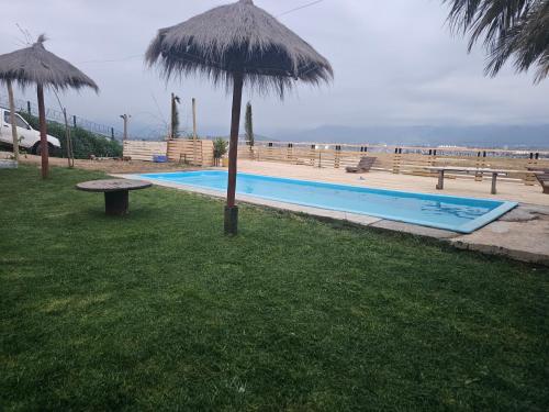 Πισίνα στο ή κοντά στο Cabaña 01, con piscina