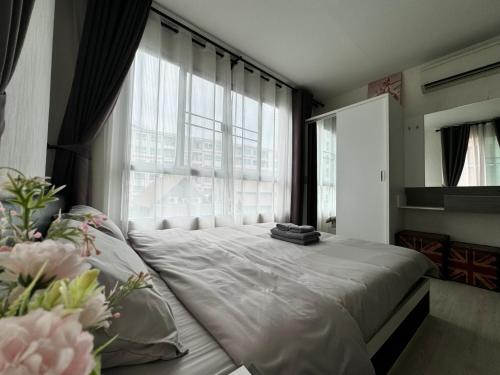 Postel nebo postele na pokoji v ubytování D condo