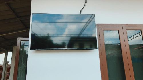 a window on the side of a building at Venn Hostel in Vientiane