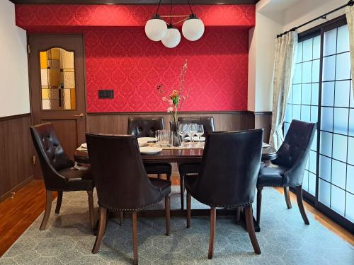 a dining room with a table and chairs at IROHA STAY HANEDA - Family-Friendly Home Stay near Haneda with Great Access to Tokyo & Yokohama in Tokyo