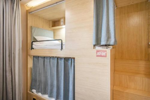 Katil atau katil-katil dalam bilik di Smiley's Long Time No See Hostel