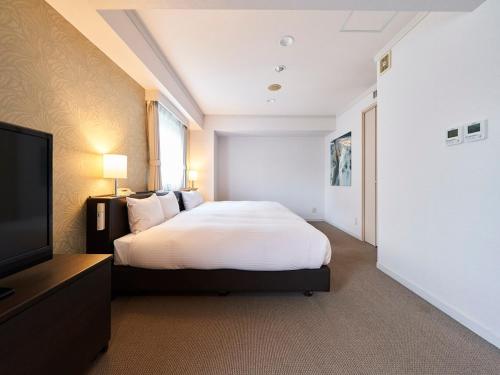 Katil atau katil-katil dalam bilik di Hotel Global View Sapporo Old Hotel Royal Stay Sapporo