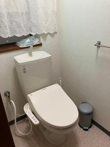Ένα μπάνιο στο Guest house KUN