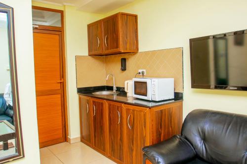 Cuisine ou kitchenette dans l'établissement Sleep Inn Hotel - Kariakoo