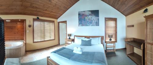Katil atau katil-katil dalam bilik di Karri Mia Chalets and Studios