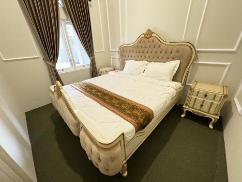 Postel nebo postele na pokoji v ubytování House of Masjid Jogokariyan