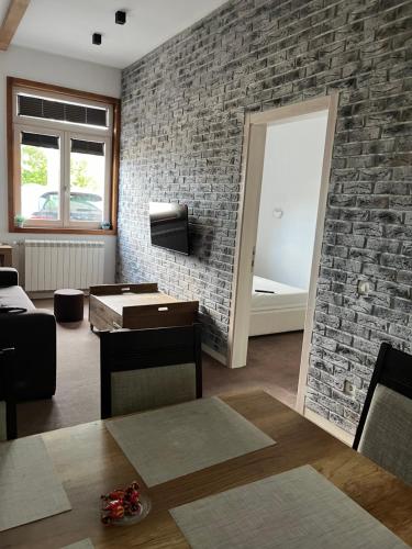 Una cama o camas en una habitación de Apartman No1,Župa Wellness & Spa Kopaonik