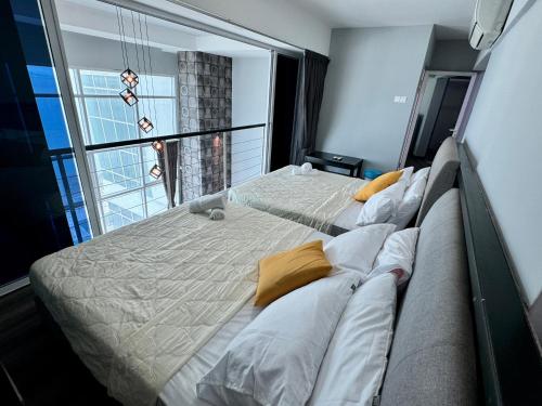 Katil atau katil-katil dalam bilik di Panoramic Seaview Maritime Suites