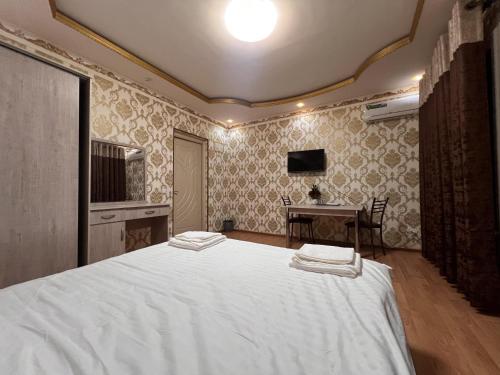 Katil atau katil-katil dalam bilik di Diyora Hostel