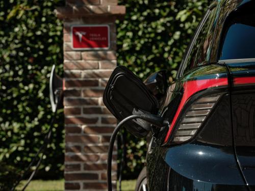 a car parked next to a brick building with a meter at Crowne Plaza Milan - Malpensa Airport by IHG in Case Nuove