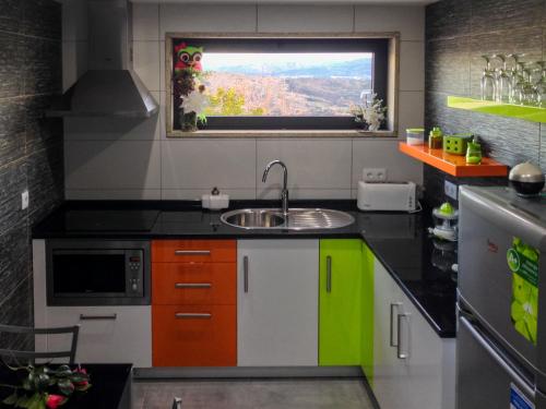Η κουζίνα ή μικρή κουζίνα στο Casas da Fraga - Serra da Estrela