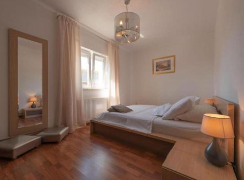 Ένα ή περισσότερα κρεβάτια σε δωμάτιο στο Charming Villa Peso