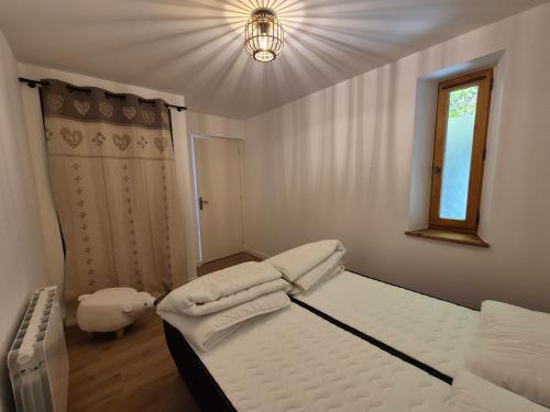 Postel nebo postele na pokoji v ubytování VAL JOLI 201 - Appartement avec balcon - Séez