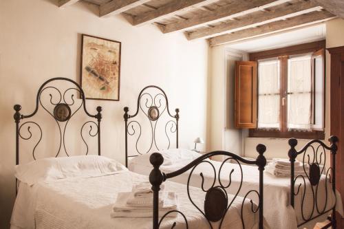 A bed or beds in a room at Wp Relais Renaissance Retreat