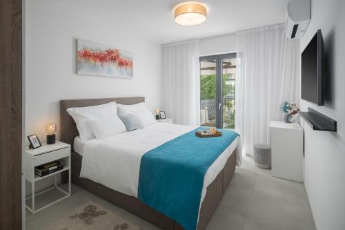 Posteľ alebo postele v izbe v ubytovaní Apartment Corsy