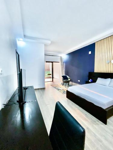 Postel nebo postele na pokoji v ubytování Villa Queens