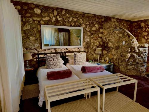 Postel nebo postele na pokoji v ubytování Eldorado Lodge