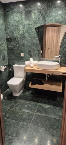 Ein Badezimmer in der Unterkunft Vineam Hotel