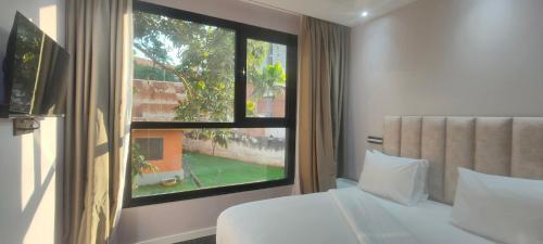 Ένα ή περισσότερα κρεβάτια σε δωμάτιο στο Premium apart billiard and balcony