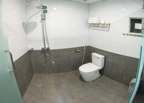 Koupelna v ubytování Khách sạn Dệt