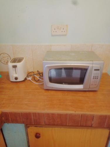 Η κουζίνα ή μικρή κουζίνα στο Bluemoon Apartment