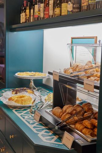 a bakery with various types of pastries on display at Hotel Villa Adriana in Monterosso al Mare