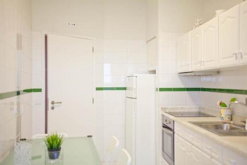 Η κουζίνα ή μικρή κουζίνα στο Apartamento Com Vista Para O Mar