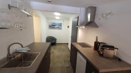 Cucina o angolo cottura di Absolute Active Roulette Apartments Kirchberg