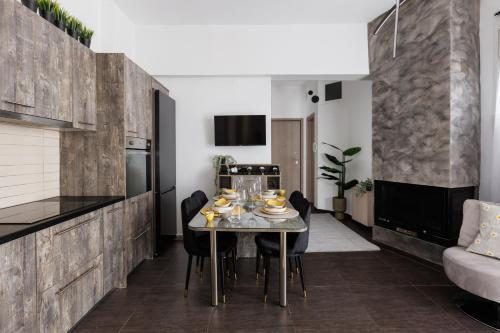 TV a/nebo společenská místnost v ubytování Mitropoli's Home - Διαμέρισμα στο κέντρο της πόλης
