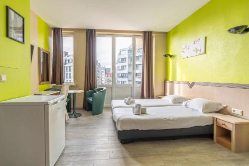 Katil atau katil-katil dalam bilik di Sleep & Go Blankenberge