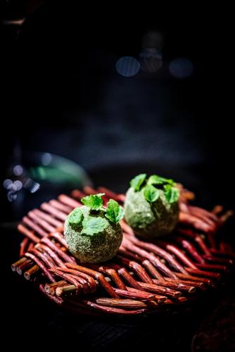 a plate with some food on top at Hotel Rum Budapest in Budapest