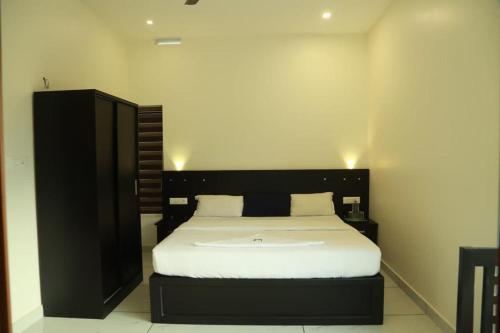 Postel nebo postele na pokoji v ubytování Mountain Wings Resort