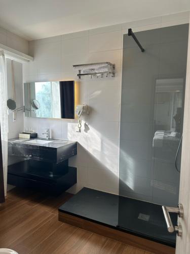 Koupelna v ubytování hotel whiteswan