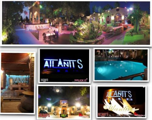 a collage of pictures of a resort at night at Studio Xanthippe in Kalamos