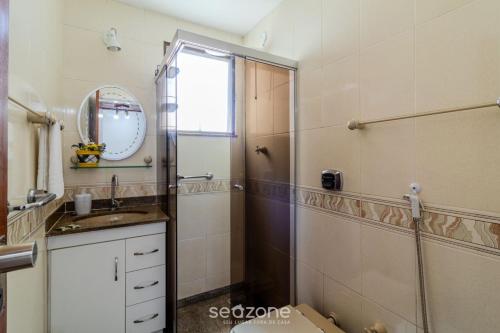 a bathroom with a shower and a sink at Apartamento 2Q c/ Varanda ADS0103 in Škorak