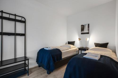 Una cama o camas en una habitación de Sif Apartments by Heimaleiga