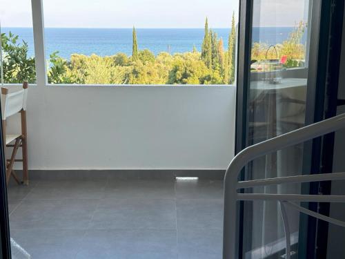 a balcony with a view of the ocean at MAREMA 2 in Kómpoi