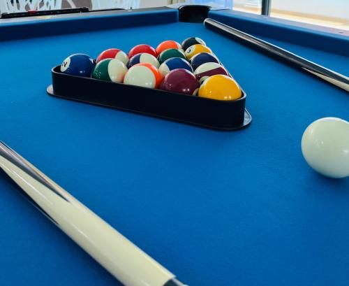 a set of pool balls on a pool table at 803 Villa AFamosa Villa in Kampong Ulu Pegoh